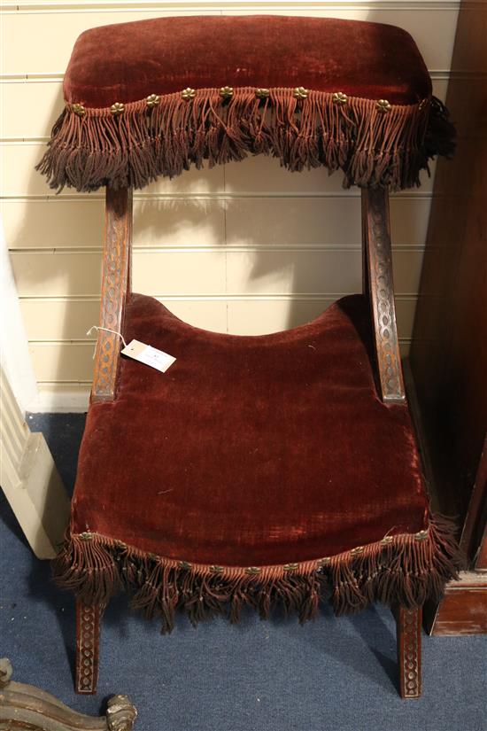 A pair of late Victorian mahogany prie dieu Height 2ft 8in.